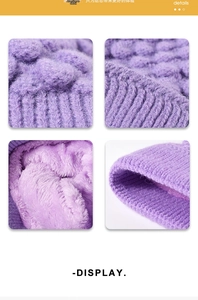 Detailed macro view of purple knit beanie showing thick texture and warm fleece lining
