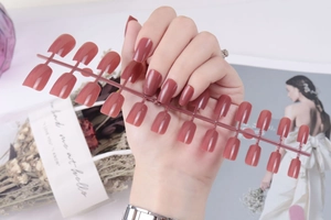 Long square dusty pink press-on nails set with glossy finish and full size range