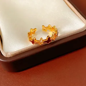 18k gold plated open ring with red enamel butterfly design in a luxury brown jewelry box