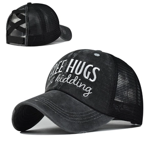 Black ponytail baseball cap with mesh back and Free Hugs embroidery