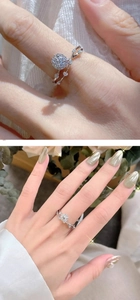 Detailed view of criss-cross silver ring with central moissanite and micro-pave diamonds