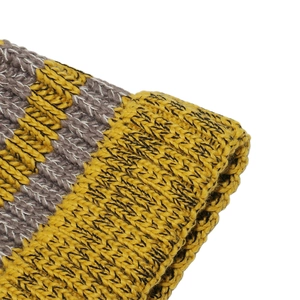 Macro shot of thick knit fabric with yellow and grey stripes for winter warm texture