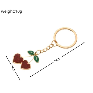 Cute red cherry heart keychain with gold metal ring and glitter details for women bags