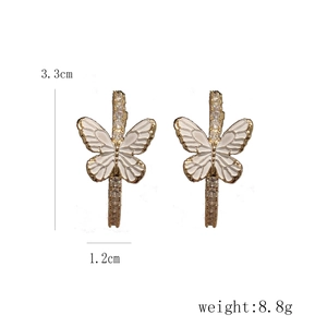 Orecchini a farfalla bianchi in oro e zirconi, dimensioni 3,3 cm per 1,2 cm