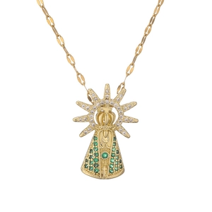 Gold plated crown necklace with green and white zircon pendant on white background