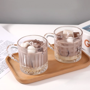 Latte-shaped glass scented candles with realistic vertical stripes for home decor