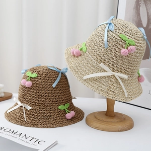 Sweet girls straw sun hat with crochet cherries and bows for beach vacation and sun protection