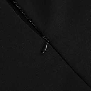 Detail of high-quality invisible zipper on black mesh evening dress fabric