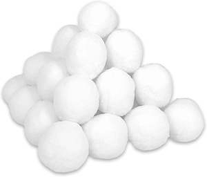 Close-up of soft white plush snowballs with fine fiber texture for holiday decoration
