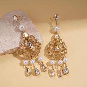 Vintage gold hoop earrings with white pearls and teardrop crystals on stone base