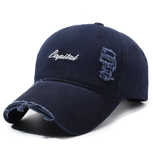 Navy blue vintage baseball cap with Capital embroidery and distressed ripped details