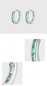 Detail of S925 sterling silver huggie earrings with bezel-set 5A green zircon stones