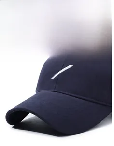 Close-up of high-quality navy blue twill cotton baseball cap with white embroidered stripes