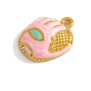 Pink and gold tennis racket pendant with sparkling enamel finish and small green detail