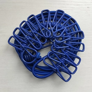 Blue portable retractable clothesline with 12 clips for outdoor camping and travel