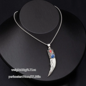 Detail view showing a 70cm chain with wolf tooth pendant and red-blue accents