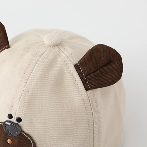 Cute beige baby baseball cap with plush animal ears and cartoon embroidery for sun protection