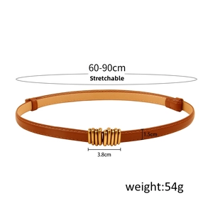 Close-up of brown stretchable skinny belt showing golden buckle and detailed measurements