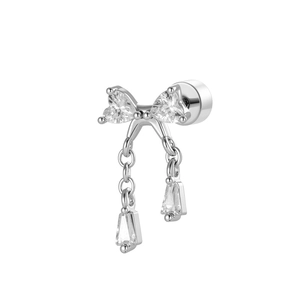 Silver bow chain earring with heart and trapezoid crystals on a white background