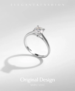 Macro detail of 1-carat moissanite ring with elegant four-prong silver setting