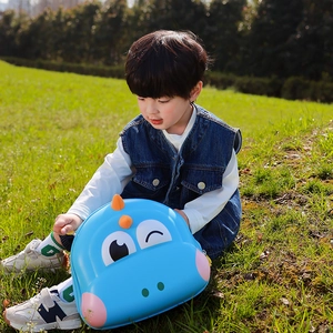 Blue dinosaur eggshell backpack for kids featuring a lightweight hard shell and cute 3D spikes
