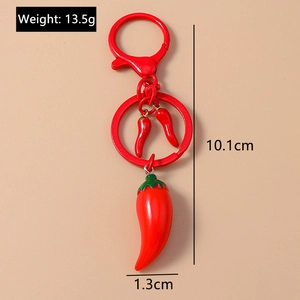 Detail view of a 10.1cm red chili keychain showing precise dimensions and glossy texture