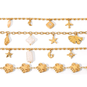 Golden stainless steel bracelet set with moon star charms and baroque pearl pendants