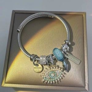 Vintage evil eye cable bangle with blue beads and pearls for couples in stainless steel