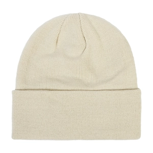 Close-up detail of a beige knitted winter beanie hat showing fine ribbing texture