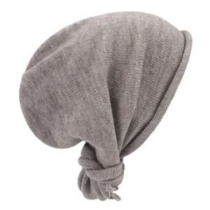 Close-up of the grey knitted beanie fabric showing soft texture and fine weave details