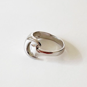 Minimalist 925 sterling silver star and moon open ring with sleek metallic finish