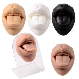Silicone lip and tongue models in multiple skin tones on acrylic display stands