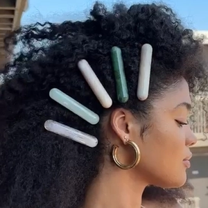 Minimalist resin hair clips set in pastel colors shown on a model outdoors
