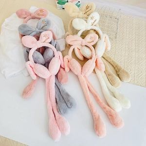 Cute plush rabbit ear earmuffs with moving bows and embroidery for winter warmth