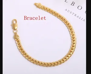Detailed close-up of a 5mm gold plated Cuban link chain bracelet with lobster clasp closure