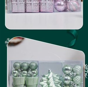 Detail of pink and green Christmas ornaments in gift boxes with festive snowflake background