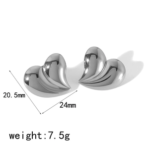 Polished silver 18K stainless steel heart earrings with textured 3D wave design