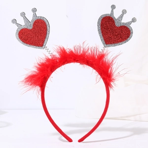 Detailed close-up of red sequin heart crown headband with soft feather trim for parties