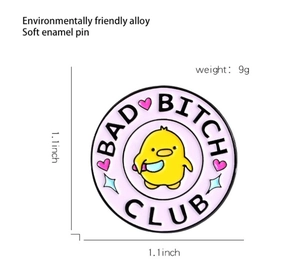 Detail view of 1.1 inch round alloy pin featuring funny duck and dimensions