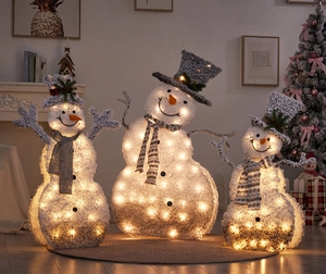 Three-piece glowing flocked snowmen set with warm LED lights and striped scarves