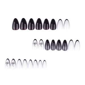 Y2K almond press-on nails with black French tips, silver glitter, and bow art designs