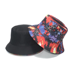 Detail of solid black and 3D colorful abstract print bucket hats for men and women