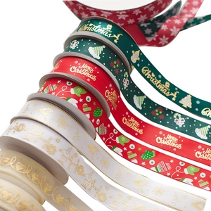 Christmas ribbons with gold foil patterns in red and green for DIY holiday gift wrapping