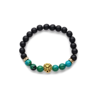 Men's tiger eye and matte black beaded bracelet featuring a golden lion head and crystal spacers