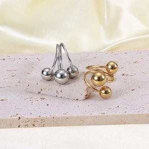 Minimalist spiral 18K gold and silver plated stainless steel rings with triple ball accents
