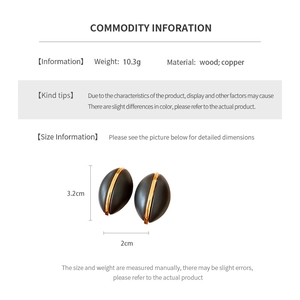 Detailed dimension guide for vintage wood and copper oval earrings showing size and weight