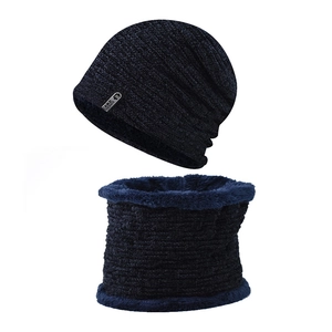 Detail view of winter knitted hat and neck gaiter set with thick blue fleece lining