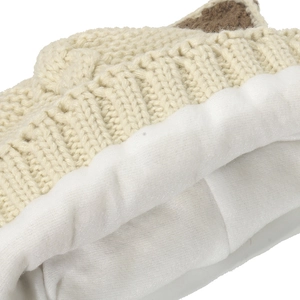 Detail of thick winter knit cat ear hat showing warm fleece lining and cream texture