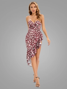 Detail view of leopard print strapless dress with side ruffle and irregular hemline