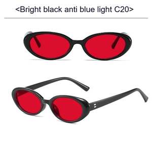 Detail view of oval retro sunglasses with bright black frames and red lenses C20